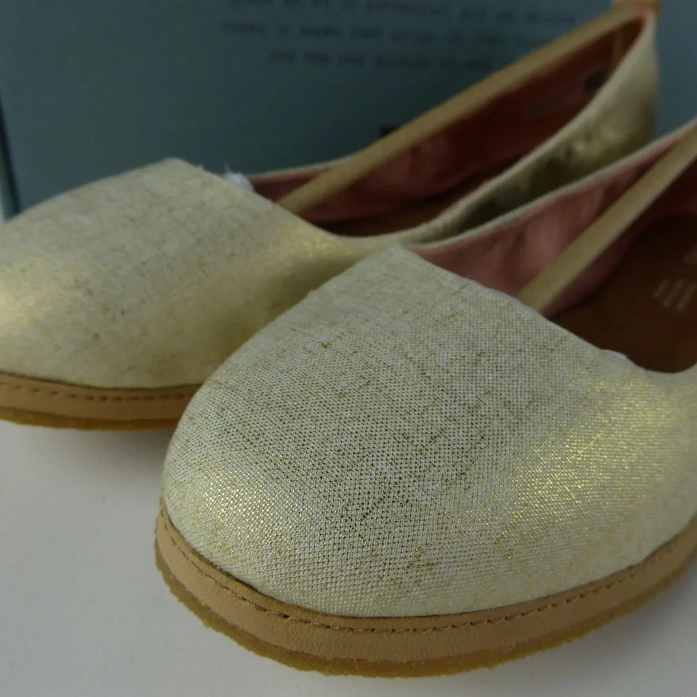 Toms Metallic Cream Slip-On Flats